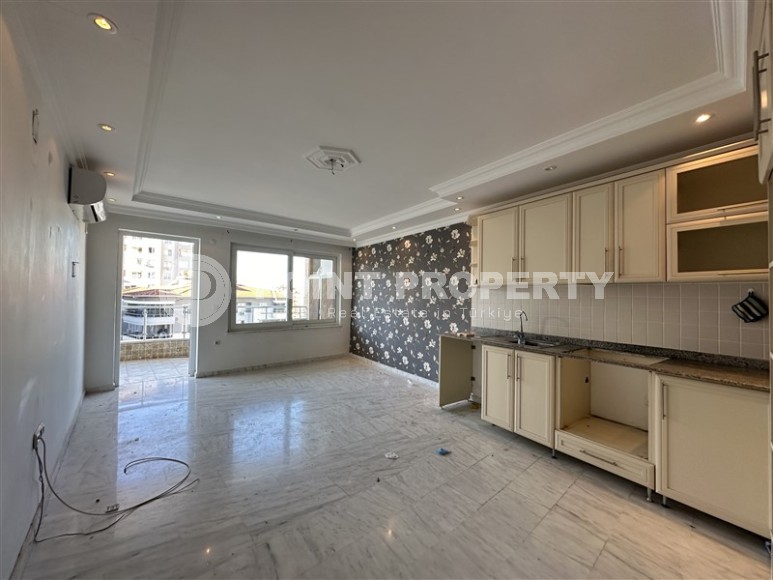 Spacious apartment with a total area of 125 m2, in the center of a calm, well-kept area of Alanya - Tosmur-id-6683-photo-2