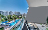 Apartment with modern design, furniture and household appliances, on the 3rd floor in a comfortable residential complex, with swimming pools, a cinema and bowling alley-id-6690-photo-14