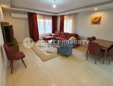 Comfortable two-level apartment 2+1, with a spacious garden terrace, 400 meters from the sea, in the center of a picturesque, well-kept area of Alanya - Kestel-id-6706-photo-1