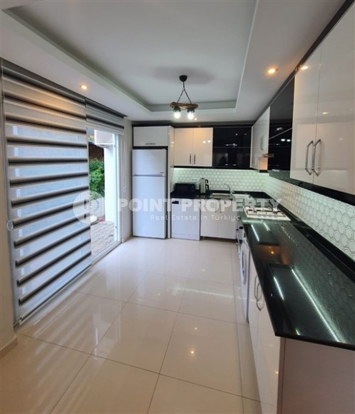 Комфортабельная двухуровневая квартира 2+1, с просторной террасой в саду, в 400 метрах от моря, в центре живописного, ухоженного района Аланьи - Кестель-id-6706-фото-5