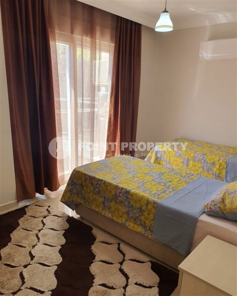 Комфортабельная двухуровневая квартира 2+1, с просторной террасой в саду, в 400 метрах от моря, в центре живописного, ухоженного района Аланьи - Кестель-id-6706-фото-8