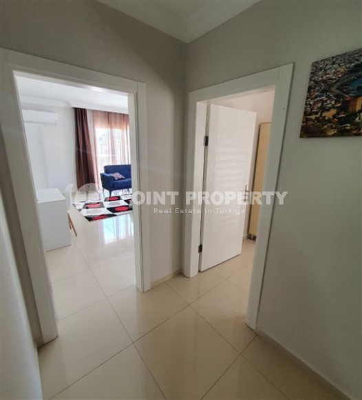 Комфортабельная двухуровневая квартира 2+1, с просторной террасой в саду, в 400 метрах от моря, в центре живописного, ухоженного района Аланьи - Кестель-id-6706-фото-9