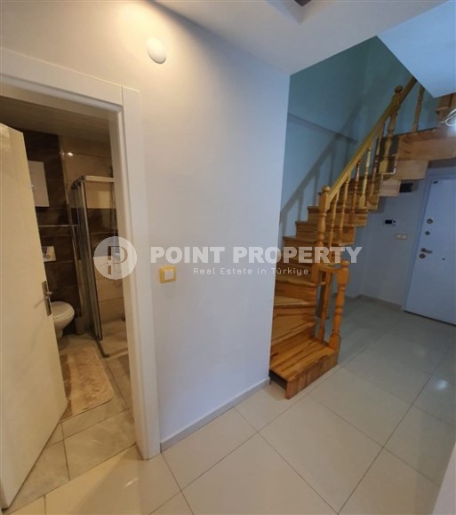 Комфортабельная двухуровневая квартира 2+1, с просторной террасой в саду, в 400 метрах от моря, в центре живописного, ухоженного района Аланьи - Кестель-id-6706-фото-11