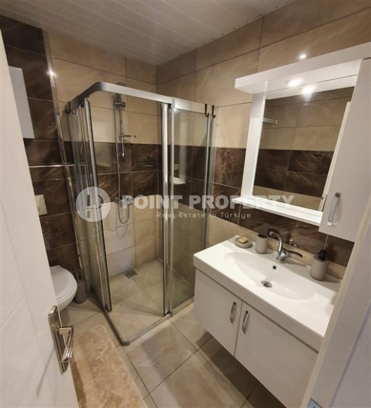 Комфортабельная двухуровневая квартира 2+1, с просторной террасой в саду, в 400 метрах от моря, в центре живописного, ухоженного района Аланьи - Кестель-id-6706-фото-12