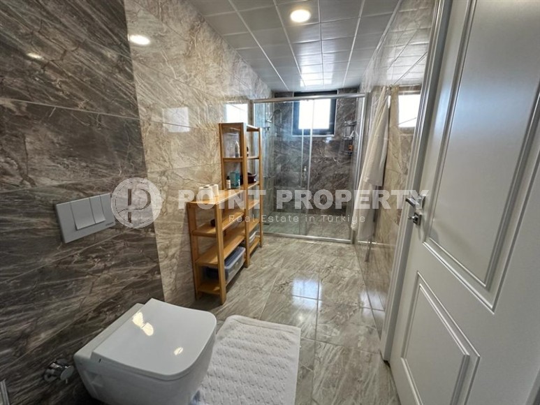 Большая двухуровневая квартира 3+1, общей площадью 230 м2, на 5-м этаже с мансардой, в центре района Махмутлар-id-6710-фото-16