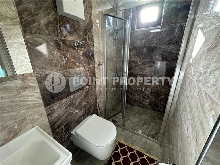 Большая двухуровневая квартира 3+1, общей площадью 230 м2, на 5-м этаже с мансардой, в центре района Махмутлар-id-6710-фото-17