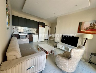 Ready-to-move-in 1+1 apartment, with new furniture and household appliances, in the modern area of Alanya - Mahmutlar-id-6713-photo-2