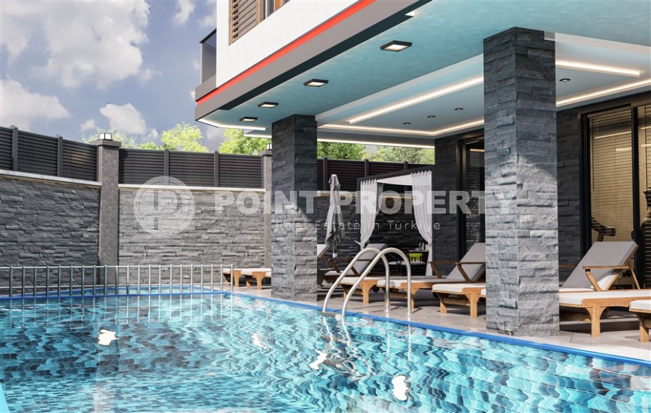 Apartments in a residential complex under construction 600 meters from the sea, a short walk from the center of Mahmutlar-id-6714-photo-3