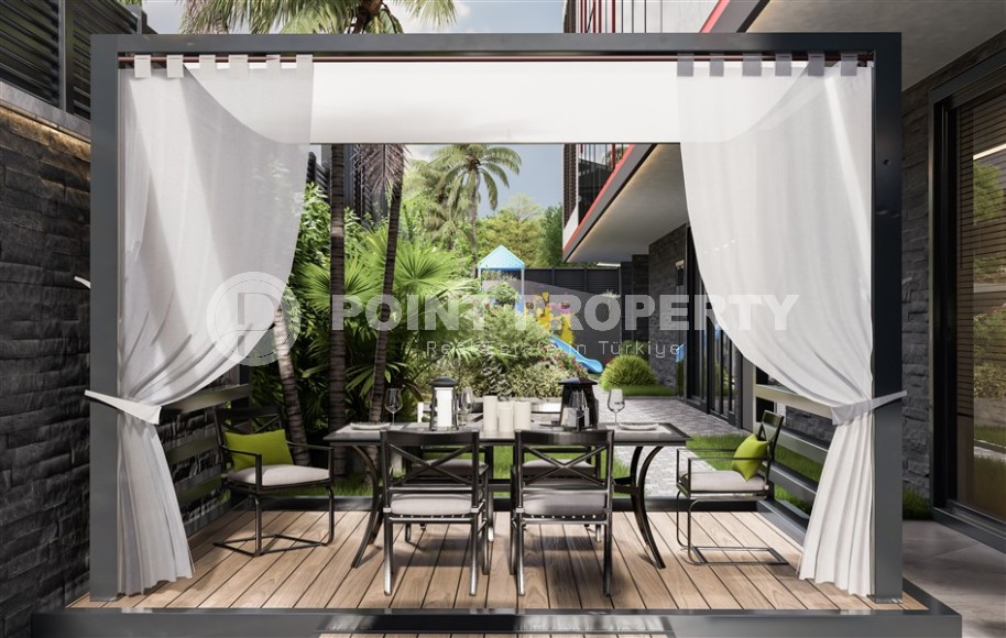 Apartments in a residential complex under construction 600 meters from the sea, a short walk from the center of Mahmutlar-id-6714-photo-4