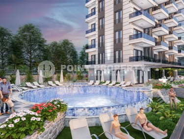 Новые квартиры в строящемся жилом комплексе, в 1500 метрах от моря, в зеленом, экологически чистом районе Аланьи - Демирташ-id-6715-фото-3