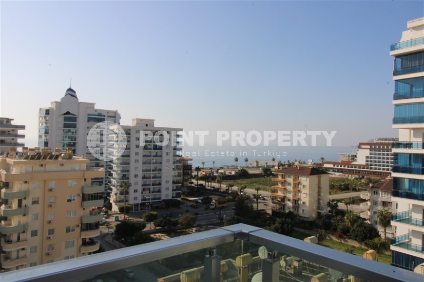 Панорамная квартира с видом на море и  горы, на 8-м этаже с мансардой, в центре современного района Аланьи - Махмутлар-id-6716-фото-18