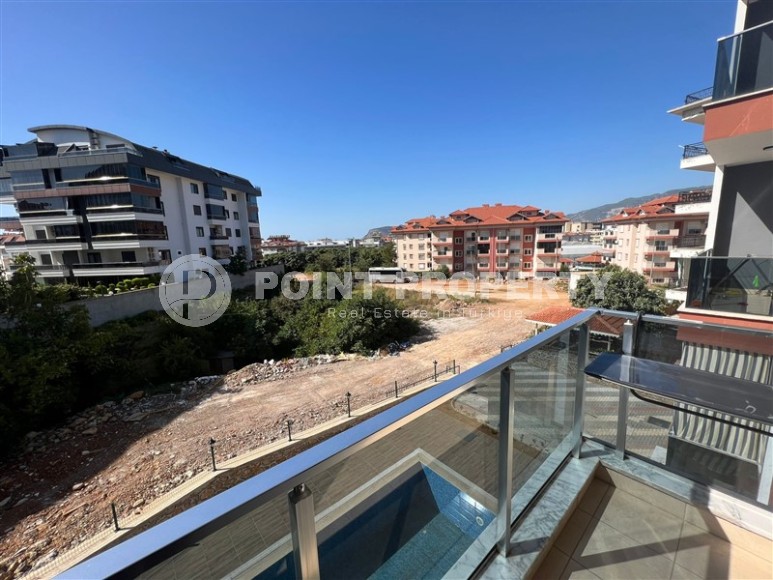 Компактная квартира 1+1, на площади 40 м2, в жилом комплексе 2022 года постройки, в живописном, ухоженном районе Аланьи - Нижняя Оба-id-6717-фото-8