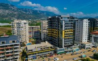 Spacious 3+1 apartment with a total area of 160 m2, 450 meters from the sea, in the modern area of Alanya - Mahmutlar-id-6721-photo-20