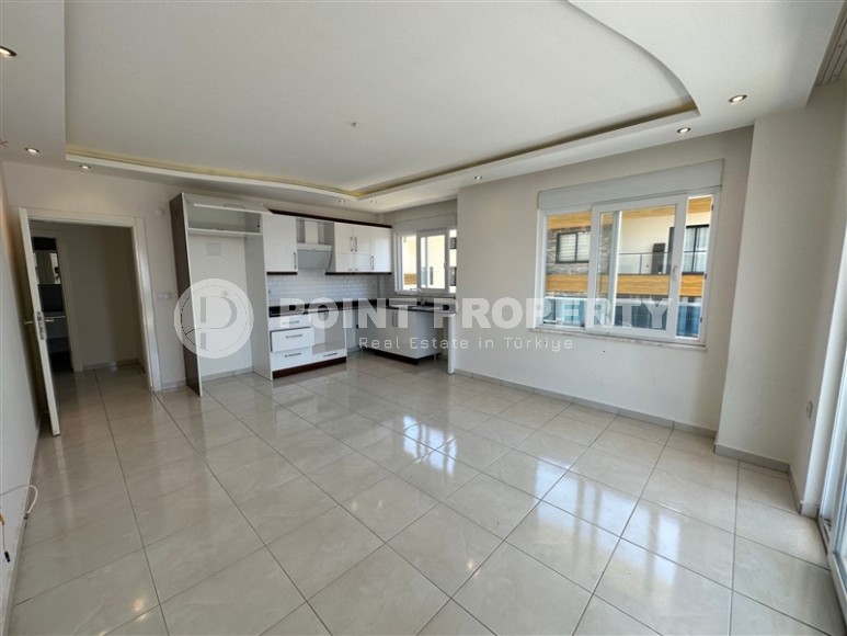 Просторная квартира с качественной чистовой отделкой, в самом центре популярного района Аланьи - Махмутлар-id-6731-фото-2