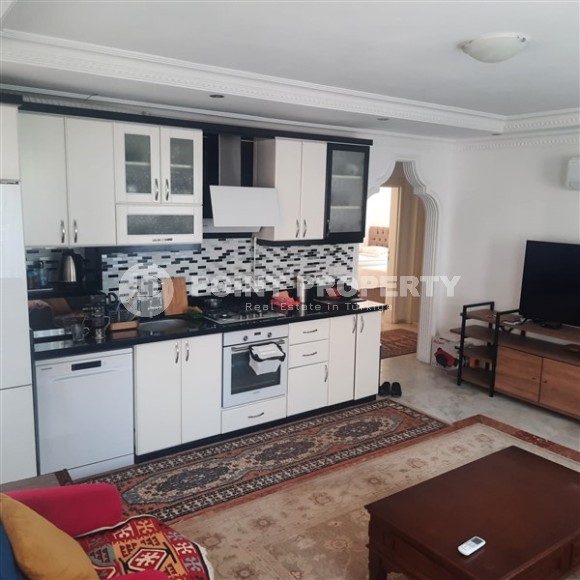 Меблированная квартира 2+1, общей площадью 100 м2, в самом центре Аланьи, в 250 метрах от знаменитого пляжа Клеопатры-id-6741-фото-3