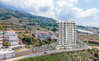 Attractive prices for a premium class project under construction in the Alanya region - Mahmutlar-id-1527-photo-17