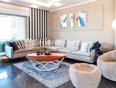 Luxurious two-level apartment with designer renovation, 250 meters from the sea, in the center of Oba district-id-6755-photo-1