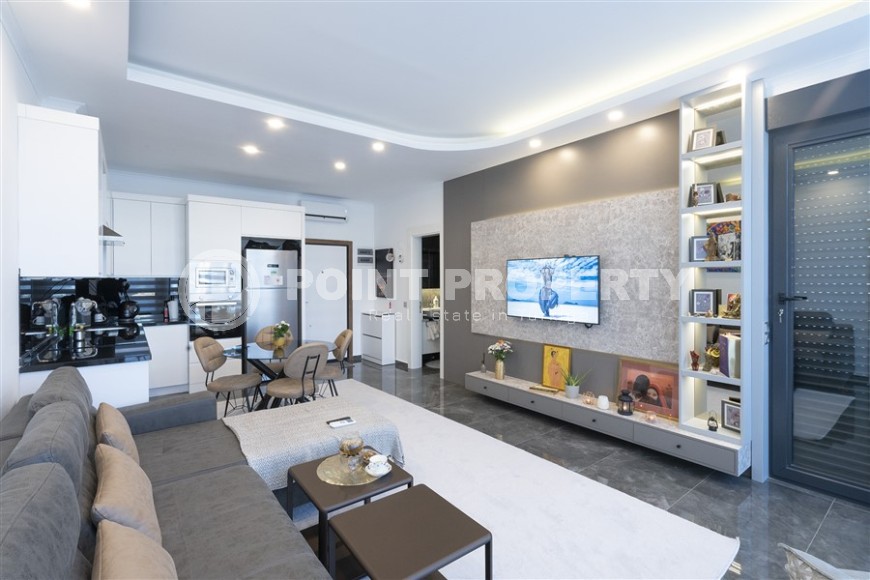 New apartment with modern design, 1100 meters from the sea, in a cozy area of Alanya - Lower Oba-id-6757-photo-2