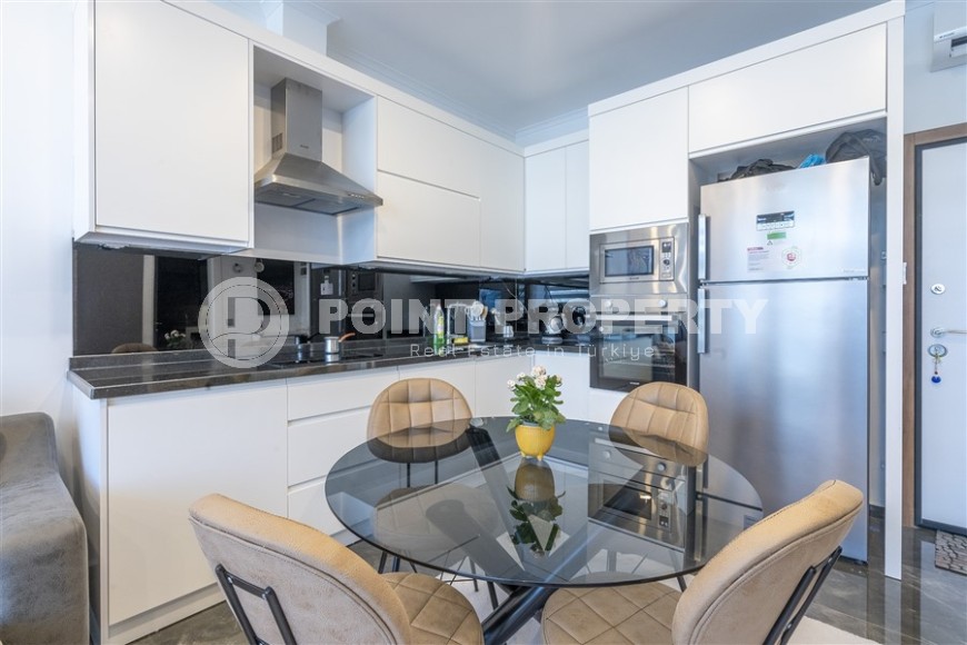 New apartment with modern design, 1100 meters from the sea, in a cozy area of Alanya - Lower Oba-id-6757-photo-4