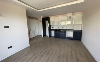 Небольшая новая квартира 1+1 в 350 метрах от моря, в центре спокойного, живописного района Аланьи - Кестель-id-6765-фото-2