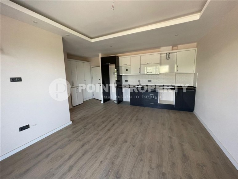 Small new 1+1 apartment 350 meters from the sea, in the center of a calm, picturesque area of Alanya - Kestel-id-6765-photo-2