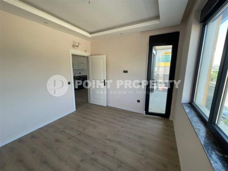 Small new 1+1 apartment 350 meters from the sea, in the center of a calm, picturesque area of Alanya - Kestel-id-6765-photo-3