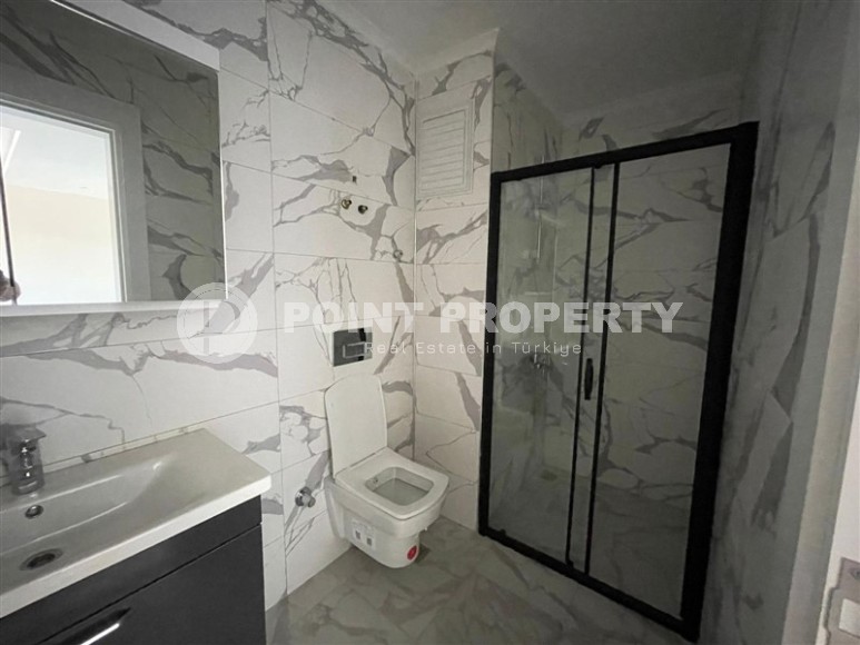 Small new 1+1 apartment 350 meters from the sea, in the center of a calm, picturesque area of Alanya - Kestel-id-6765-photo-8