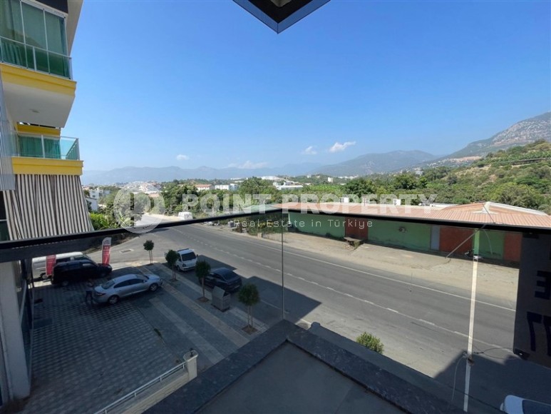 Small new 1+1 apartment 350 meters from the sea, in the center of a calm, picturesque area of Alanya - Kestel-id-6765-photo-9