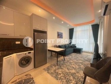 Comfortable 1+1 apartment 350 meters from the beach, in the center of the modern area of Alanya - Mahmutlar-id-6778-photo-2