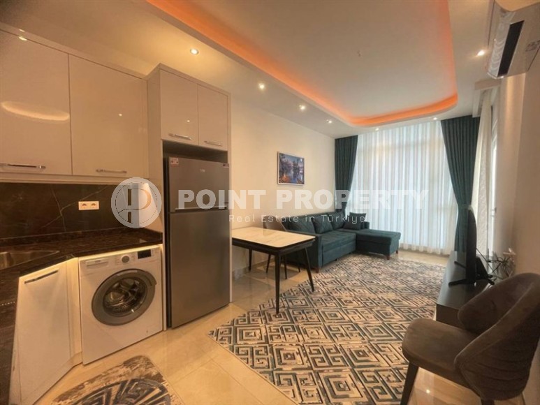 Комфортабельная квартира 1+1 в 350 метрах от пляжа, в центре современного района Аланьи - Махмутлар-id-6778-фото-2