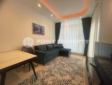 Comfortable 1+1 apartment 350 meters from the beach, in the center of the modern area of Alanya - Mahmutlar-id-6778-photo-3