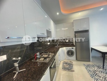 Comfortable 1+1 apartment 350 meters from the beach, in the center of the modern area of Alanya - Mahmutlar-id-6778-photo-4