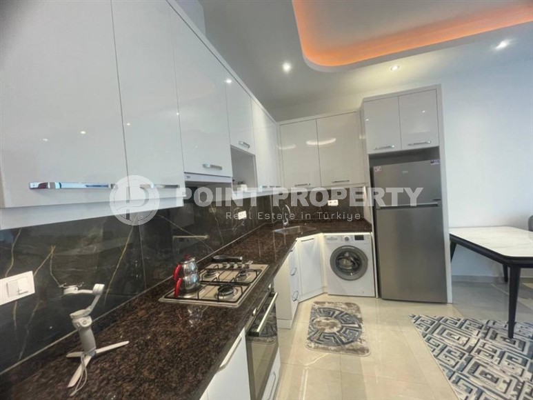 Комфортабельная квартира 1+1 в 350 метрах от пляжа, в центре современного района Аланьи - Махмутлар-id-6778-фото-4