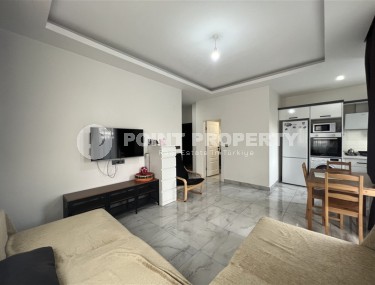 Modern 1+1 apartment, on an area of 55 m2, in a comfortable residential complex in the center of Mahmutlar district-id-6779-photo-2
