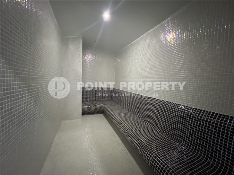 Современная квартира 1+1, на площади 55 м2, в благоустроенном жилом комплексе в центре района Махмутлар-id-6779-фото-9