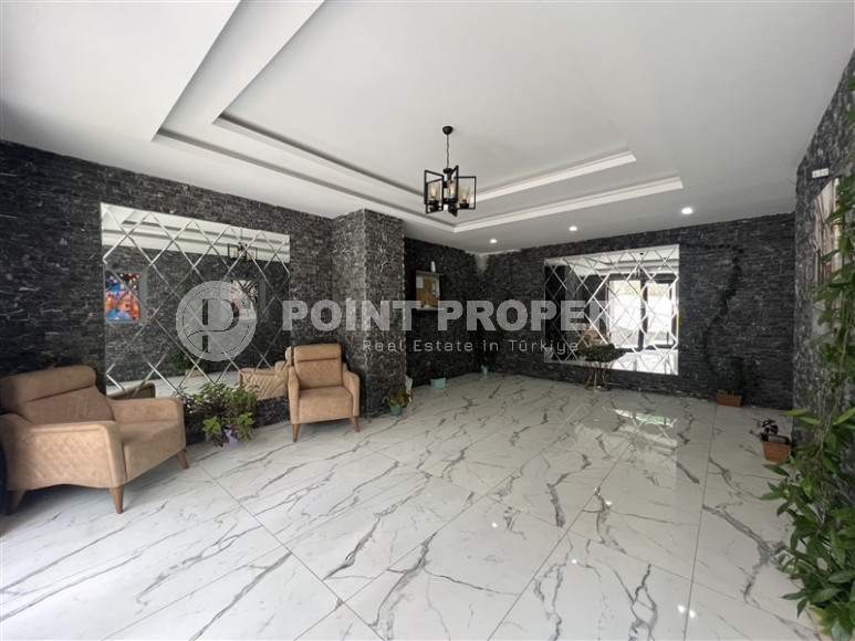 Современная квартира 1+1, на площади 55 м2, в благоустроенном жилом комплексе в центре района Махмутлар-id-6779-фото-10