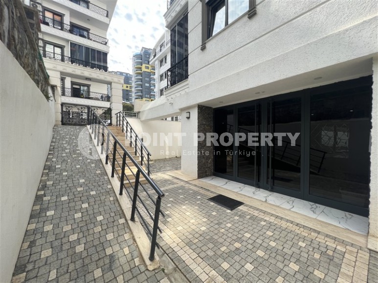 Современная квартира 1+1, на площади 55 м2, в благоустроенном жилом комплексе в центре района Махмутлар-id-6779-фото-13