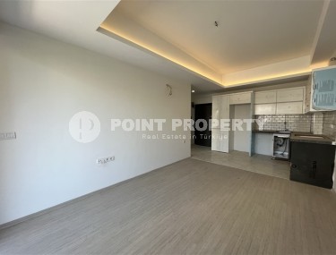 Небольшая квартира с качественной чистовой отделкой в 1200 метрах от моря, в спокойном районе Аланьи - Авсаллар-id-6781-фото-2