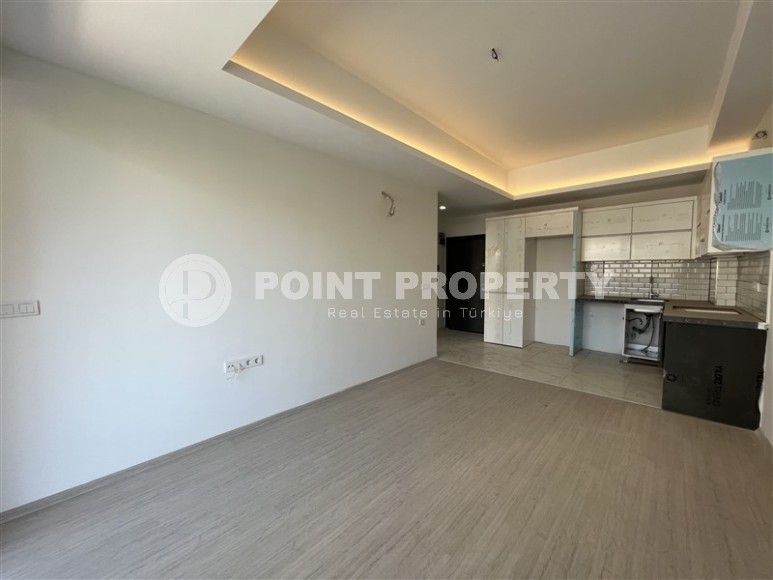 Небольшая квартира с качественной чистовой отделкой в 1200 метрах от моря, в спокойном районе Аланьи - Авсаллар-id-6781-фото-2