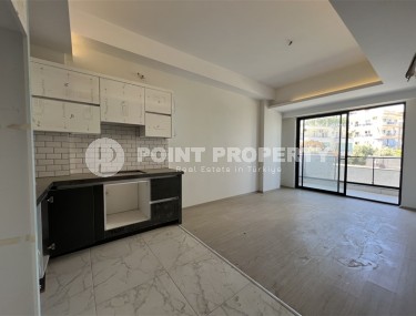 Небольшая квартира с качественной чистовой отделкой в 1200 метрах от моря, в спокойном районе Аланьи - Авсаллар-id-6781-фото-3