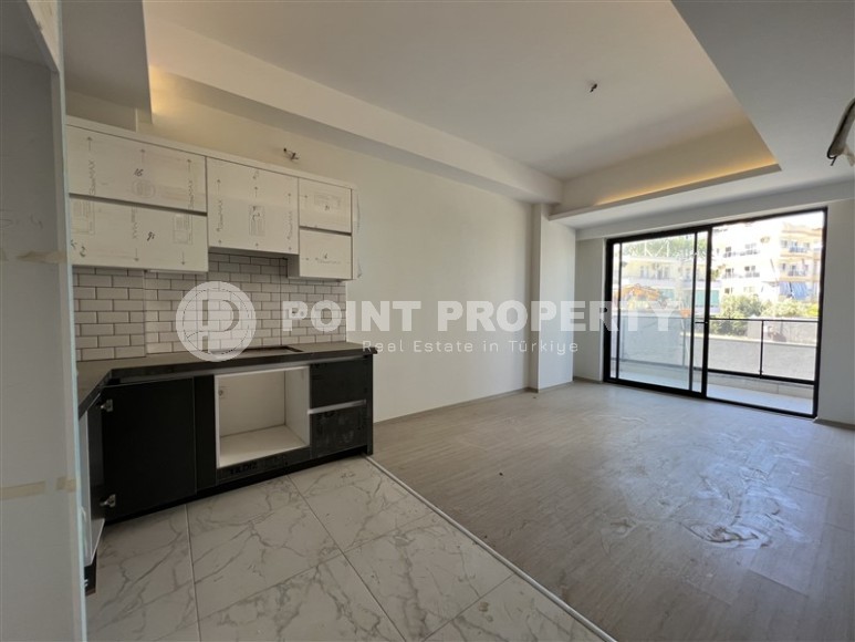 Небольшая квартира с качественной чистовой отделкой в 1200 метрах от моря, в спокойном районе Аланьи - Авсаллар-id-6781-фото-3