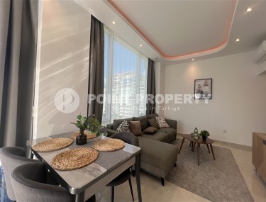 Comfortable 1+1 apartment, on an area of 65 m2, in a comfortable residential complex in the center of Mahmutlar district-id-6783-photo-2