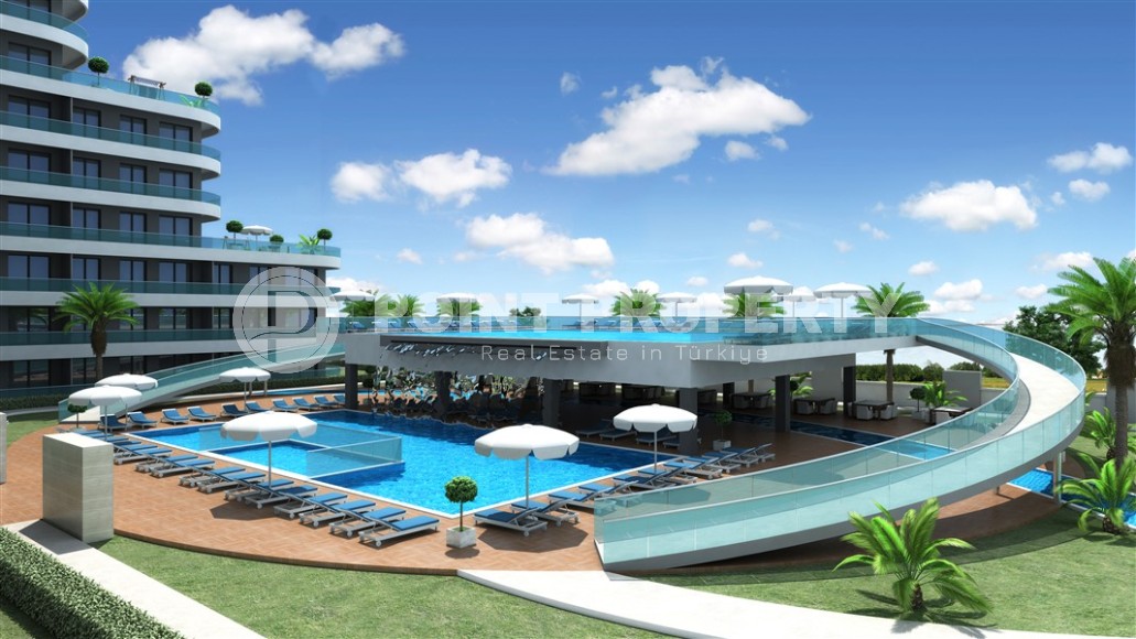 A new investment project in a promising area of Antalya - Altintas - a 10-storey residential complex with organized internal infrastructure-id-6790-photo-3