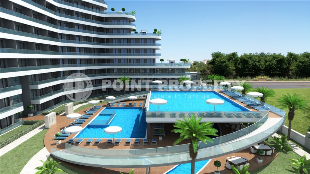 A new investment project in a promising area of Antalya - Altintas - a 10-storey residential complex with organized internal infrastructure-id-6790-photo-4