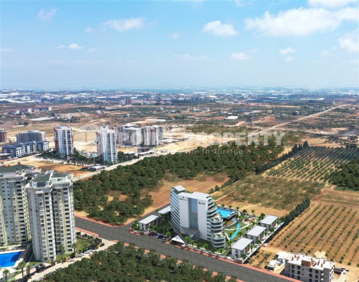 A new investment project in a promising area of Antalya - Altintas - a 10-storey residential complex with organized internal infrastructure-id-6790-photo-14