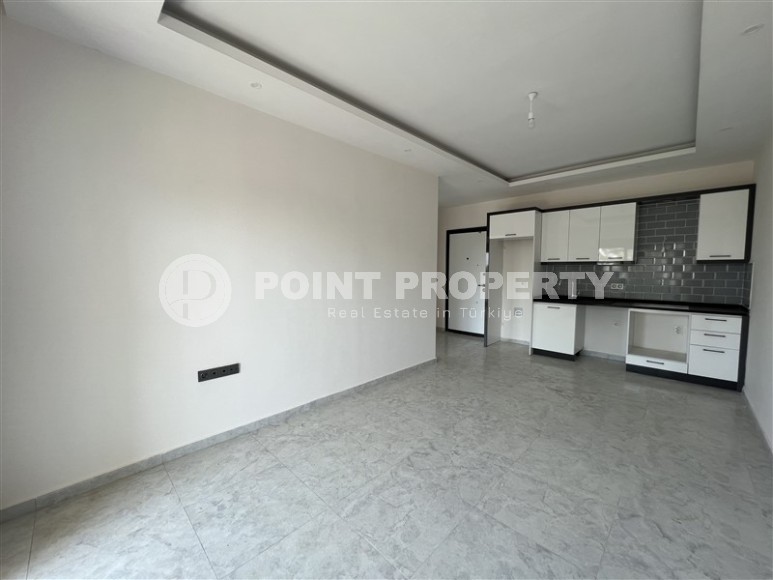 Новая квартира с чистовой отделкой в 1400 метрах от моря, в спокойном районе Аланьи - Авсаллар-id-6796-фото-2