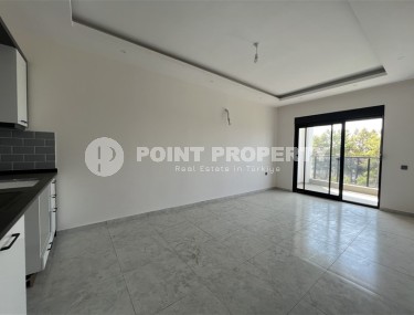 Новая квартира с чистовой отделкой в 1400 метрах от моря, в спокойном районе Аланьи - Авсаллар-id-6796-фото-3