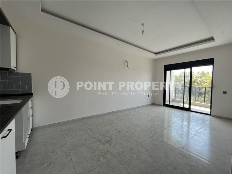 Новая квартира с чистовой отделкой в 1400 метрах от моря, в спокойном районе Аланьи - Авсаллар-id-6796-фото-3