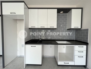 Новая квартира с чистовой отделкой в 1400 метрах от моря, в спокойном районе Аланьи - Авсаллар-id-6796-фото-4