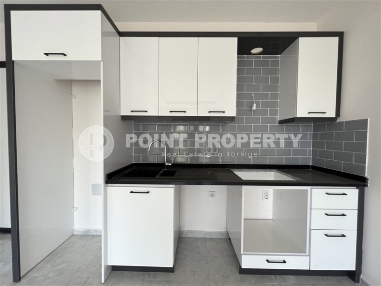 Новая квартира с чистовой отделкой в 1400 метрах от моря, в спокойном районе Аланьи - Авсаллар-id-6796-фото-4